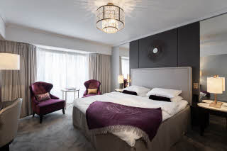 room superior king size bed at grand hotel oslo in norway
