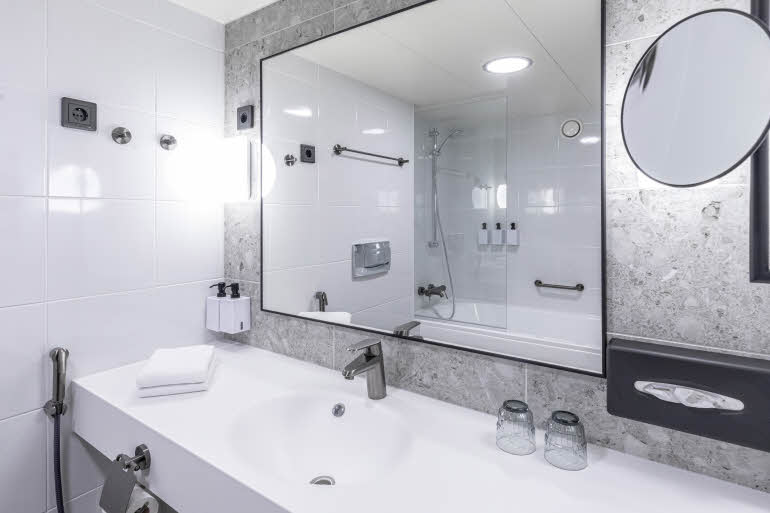 bathroom in room superior at scandic jyvaskyla station in finland