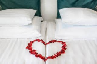 Heart of flower on bed