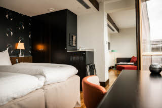 view of room and bed in superior room at scandic anglais in stockholm